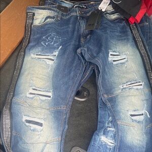 AMIRI Blue Distressed Skinny Jeans with Black Accents